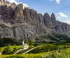 Views over Gardena pass near Selva di Val Gardena, Italy, on sunny summer Monday 26th of June 2023. Gardena pass is pass over which road connects Val Gardena valley and Badia valley in Italian Dolomites.